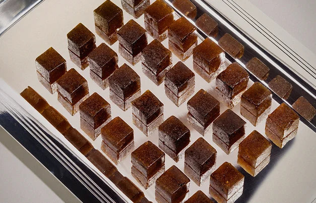 Tempo gummies arranged on a silver tray